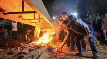 Bupati Kuansing Dr. H. Suhardiman Amby, Tunjukan Komitmennya dalam Mendengar Langsung Aspirasi Masyarakat saat Menghadiri Kegiatan Melayur Jalur Jitu Kuantan